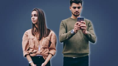 2020/11/Bad-Habits-Every-Man-Should-Stop_-Guy-Addicted-to-Phone-While-Girlfriend-Upset-and-Looks-Away.jpg