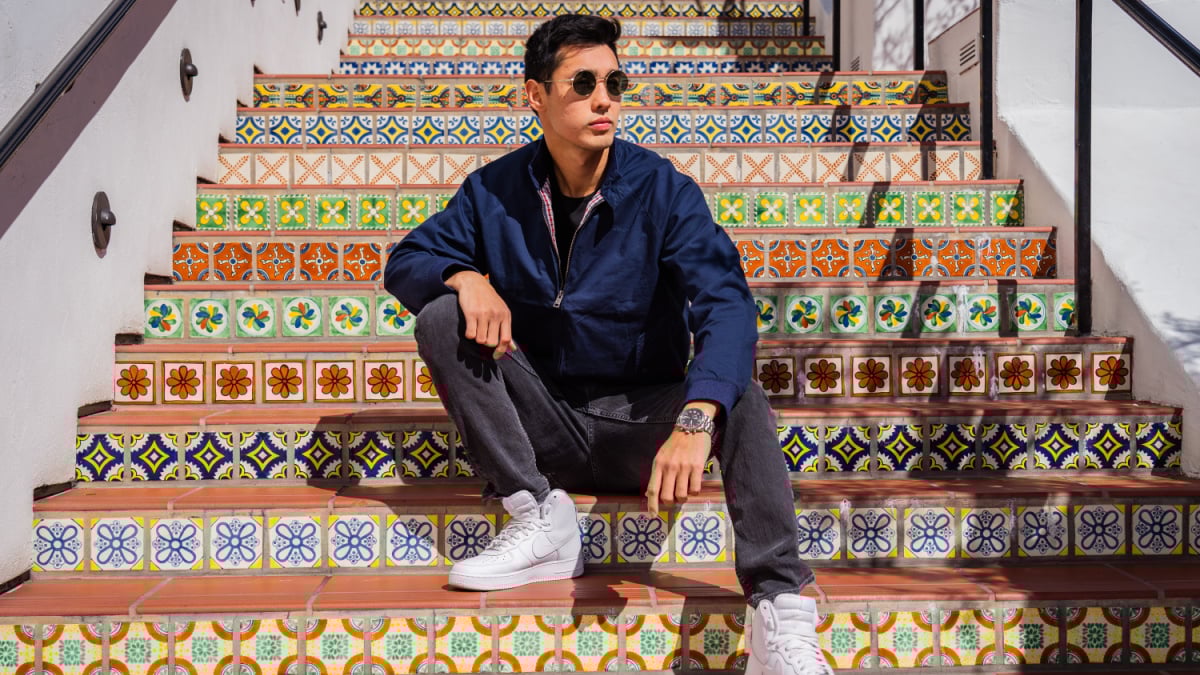 Ben Sherman Review Model on Staircase Wearing Ben Sherman Jacket