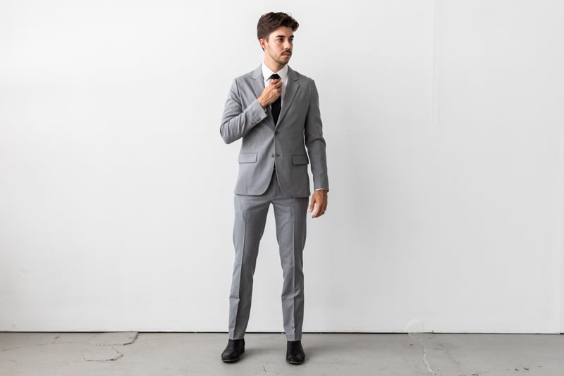 Bluffworks Presidio Blazer and Pants model fixing tie