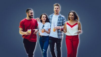 2022/05/Double-Date-Ideas-Two-Couples-Walking-Smiling-and-Drinking-Tea.jpg