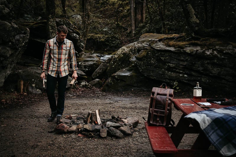 model wearing outerknown clothes at campground