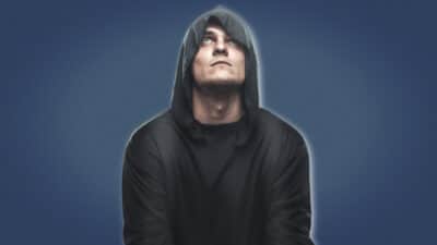 2021/04/Monk-Mode_-Man-in-Dark-Hood-Looking-Up-With-Head-Covered.jpg