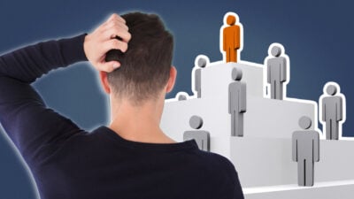 2021/06/Socio-Sexual-Hierarchy_-Graphic-of-Man-Scratching-Head-Next-to-Social-Hierarchy-Pyramid.jpg
