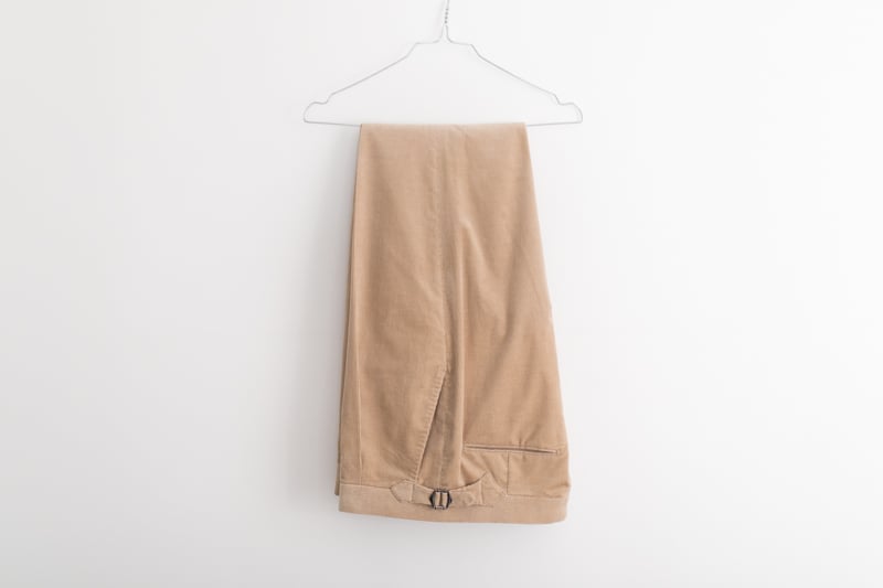 Suitsupply Custom Suit pants hanging on hanger