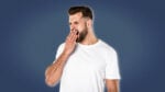 Things Men Should do Every Night Nighttime routine for Men Man in White ShirtYawning