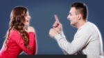 Things to Talk About With Your Crush Man and girl on date with girl laughing at mans gesture
