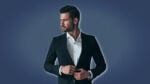 Traits of a High Value Man Attractive Man in Suit Looking to the Distance