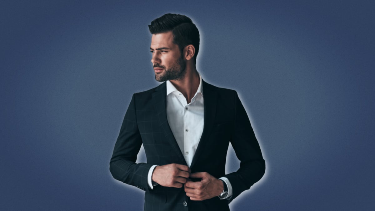 Traits of a High Value Man Attractive Man in Suit Looking to the Distance